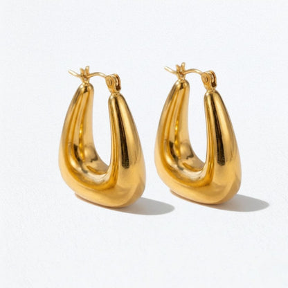 Boucles d'oreilles creoles acier inoxydable or Iris Bellaime